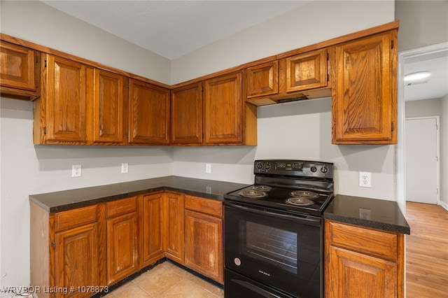 kitchen with black electric range