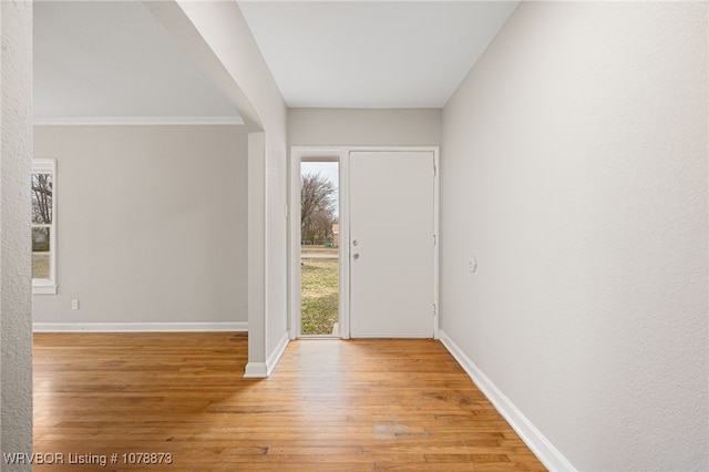 foyer with light wood-type flooring