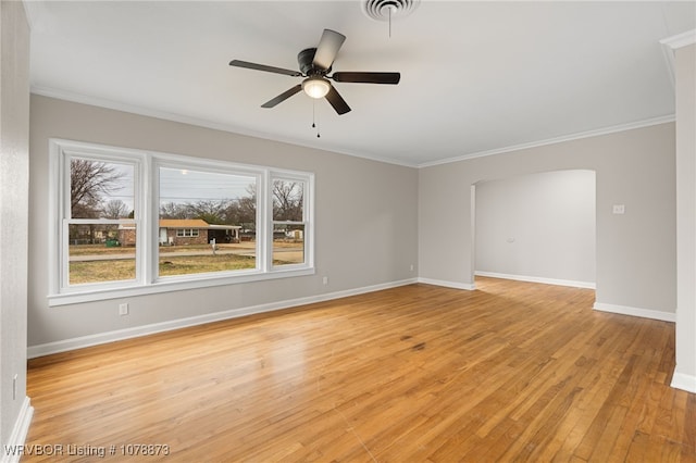 unfurnished room with crown molding, ceiling fan, and light hardwood / wood-style flooring