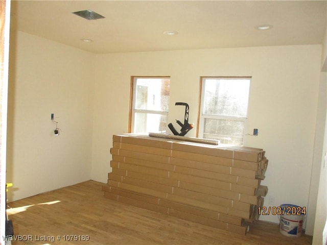 spare room with recessed lighting and wood finished floors