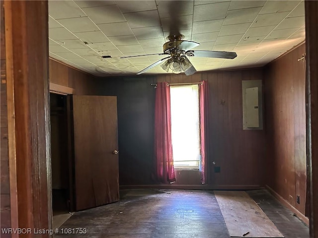3329 Furry Way, Van Buren, AR 72956 - empty room with ceiling fan, electric panel, and wood walls