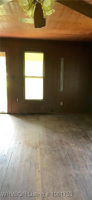 3329 Furry Way, Van Buren, AR 72956 - empty room featuring healthy amount of natural light, wood-type flooring, and wood ceiling