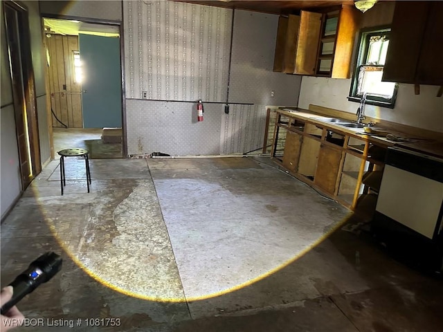 3329 Furry Way, Van Buren, AR 72956 - kitchen with concrete floors and brown cabinets