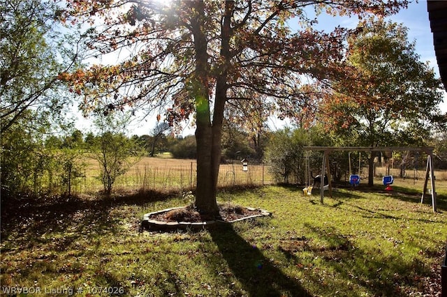 view of yard with a playground