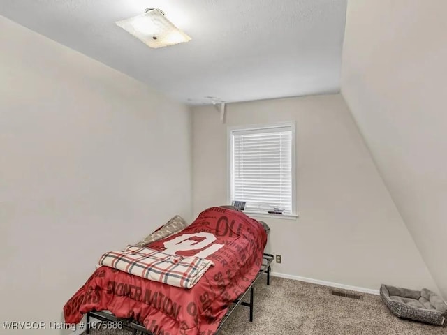 bedroom featuring carpet