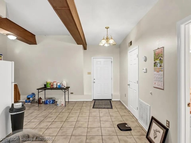 entryway featuring vaulted ceiling with beams, light tile patterned floors, and a notable chandelier