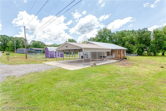 422 Holly St, Hartford, AR 72938 - back of house with driveway and a carport