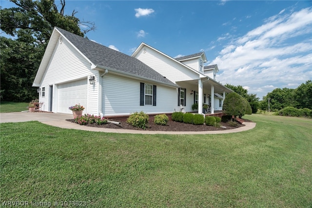 view of property exterior featuring covered porch, a garage, and a yard