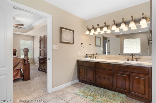 bathroom featuring vanity, tile patterned floors, ceiling fan, and ornamental molding