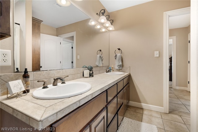 bathroom featuring tile patterned floors and vanity