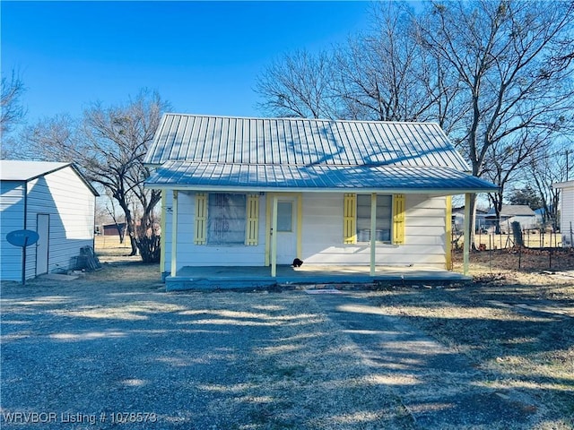 view of front of home featuring covered porch