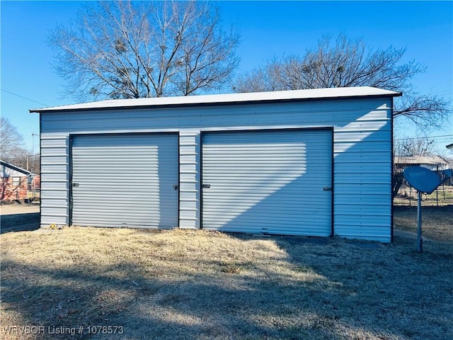 view of outbuilding featuring a garage