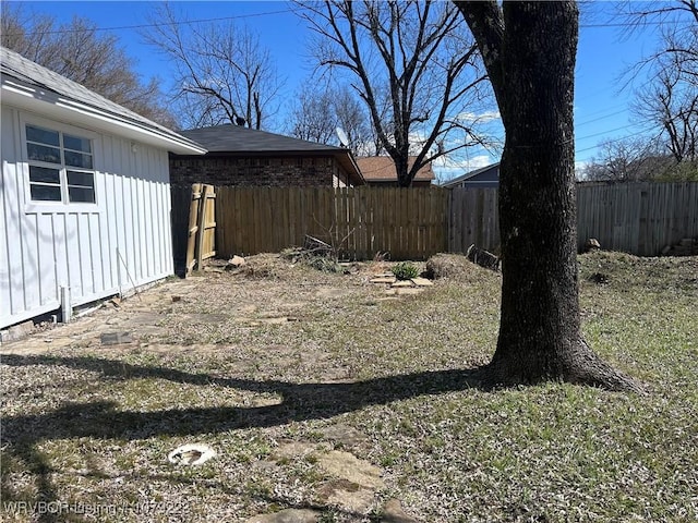 view of yard featuring fence