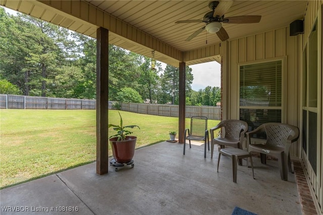 12905 Limestone Dr, Fort Smith, AR 72916 - fenced backyard featuring ceiling fan, a patio, and view of wooded area