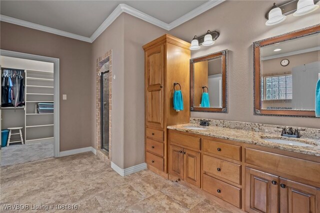 12905 Limestone Dr, Fort Smith, AR 72916 - bathroom featuring crown molding, double vanity, a shower stall, and a spacious closet