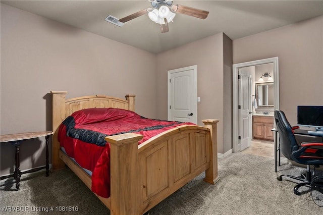 12905 Limestone Dr, Fort Smith, AR 72916 - bedroom featuring light carpet, connected bathroom, ceiling fan, and a desk