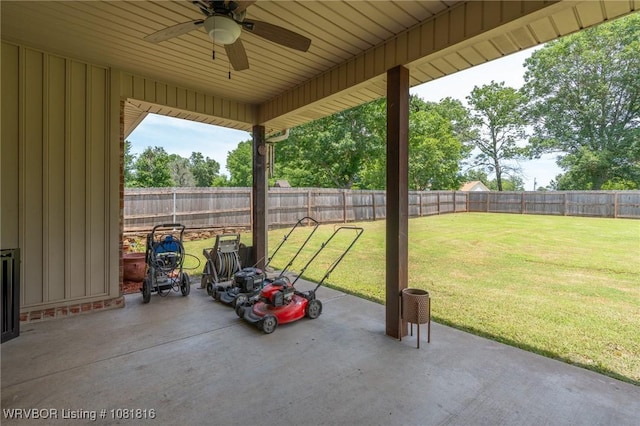 12905 Limestone Dr, Fort Smith, AR 72916 - fenced backyard featuring ceiling fan and a patio area