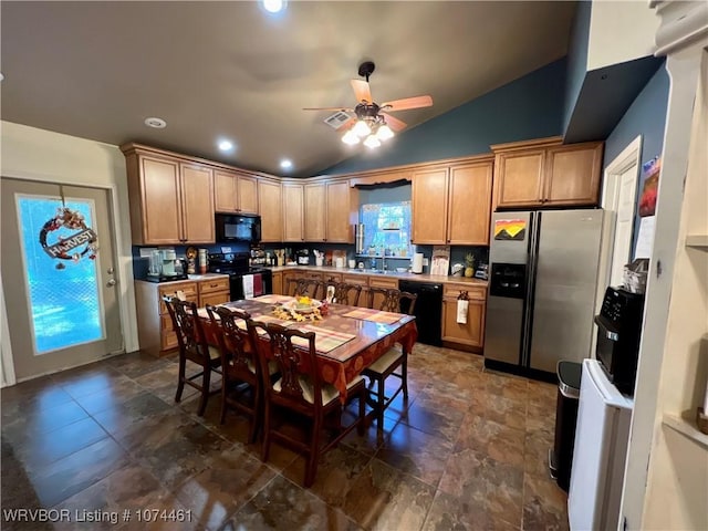 kitchen featuring black appliances, sink, vaulted ceiling, ceiling fan, and decorative backsplash