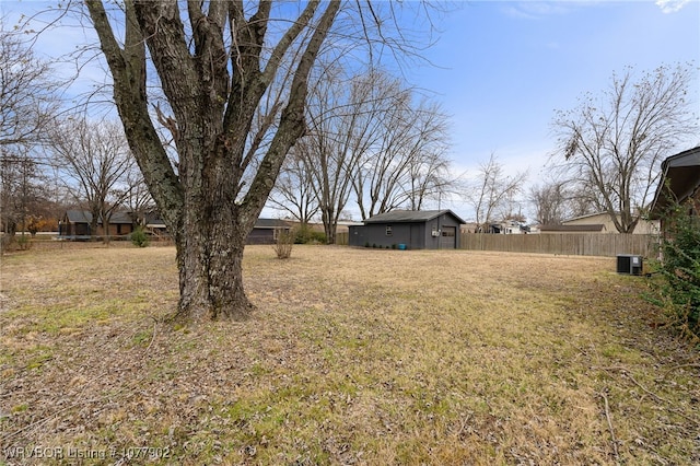 view of yard with central AC unit