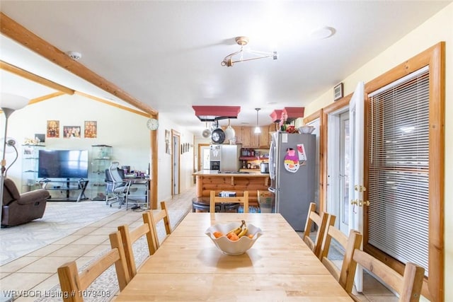 dining area featuring visible vents and light tile patterned floors