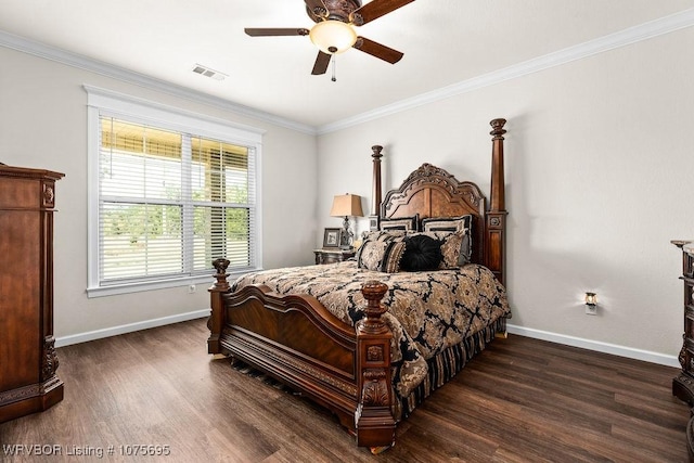 bedroom featuring dark hardwood / wood-style floors, ceiling fan, and crown molding