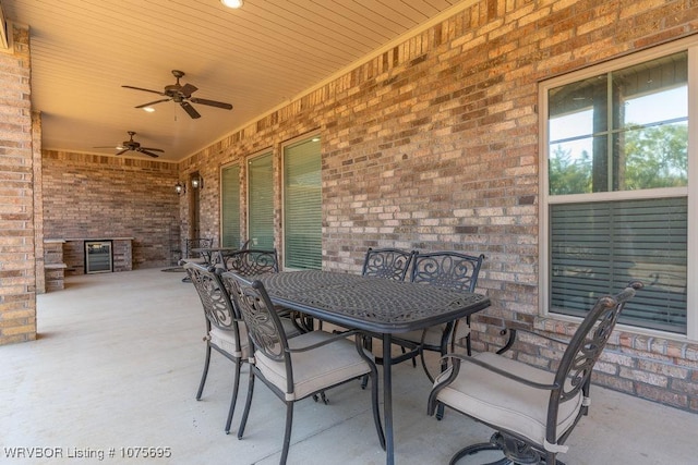 view of patio featuring ceiling fan