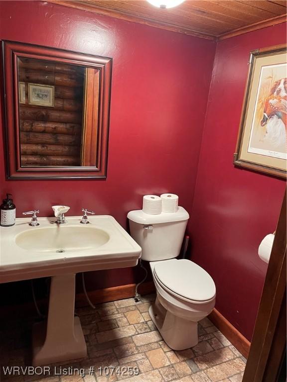 bathroom featuring sink and toilet