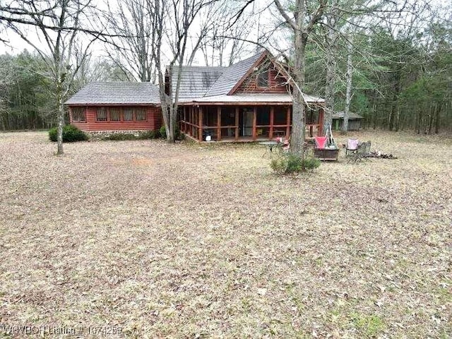 view of front facade featuring a sunroom