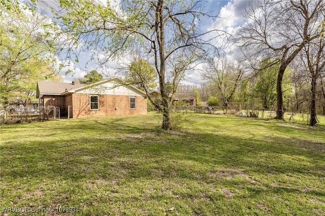 view of yard with fence