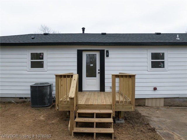 48 W Gary St, Greenwood, AR 72936 - rear view of property with a wooden deck and central AC unit