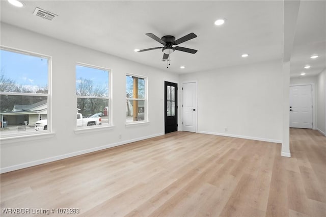 48 W Gary St, Greenwood, AR 72936 - empty room with ceiling fan and light wood-type flooring