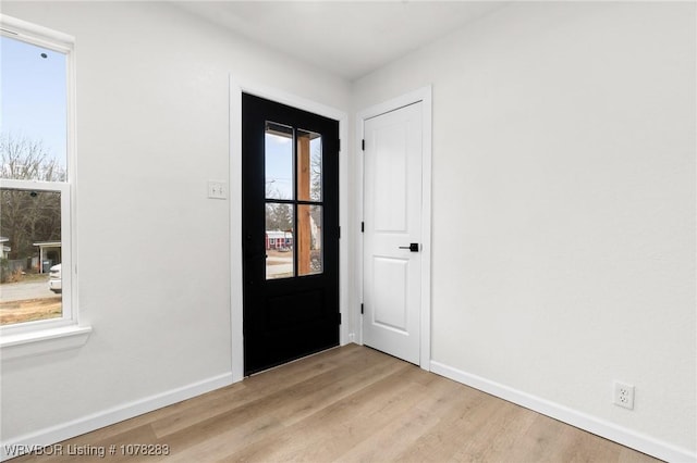 48 W Gary St, Greenwood, AR 72936 - entryway featuring a wealth of natural light and light wood-type flooring