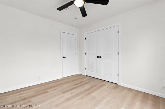 48 W Gary St, Greenwood, AR 72936 - unfurnished bedroom with ceiling fan, a closet, and light hardwood / wood-style floors