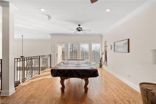 rec room featuring ceiling fan, light wood-style flooring, pool table, baseboards, and crown molding