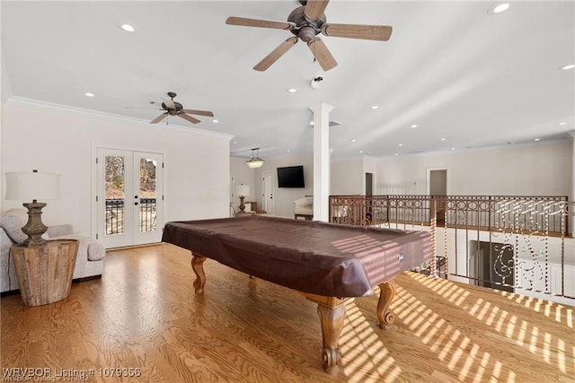 rec room featuring french doors, pool table, crown molding, and wood finished floors