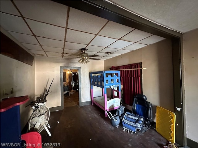 bedroom featuring a drop ceiling