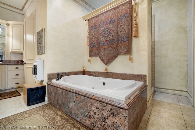 bathroom featuring tile patterned floors, vanity, heating unit, crown molding, and a relaxing tiled tub