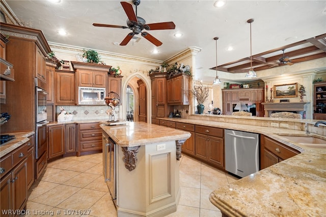 kitchen featuring sink, a center island, coffered ceiling, beamed ceiling, and appliances with stainless steel finishes