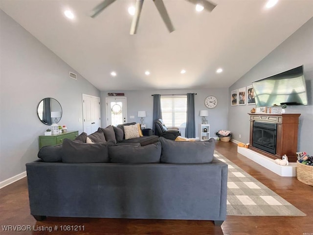 527 Polk Road 59, Mena, AR 71953 - living area featuring vaulted ceiling, a glass covered fireplace, a ceiling fan, baseboards, and recessed lighting