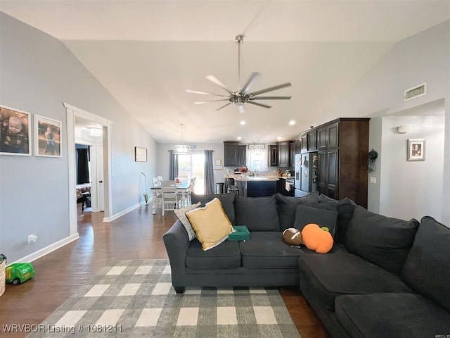 527 Polk Road 59, Mena, AR 71953 - living room featuring lofted ceiling, light wood finished floors, ceiling fan, baseboards, and recessed lighting