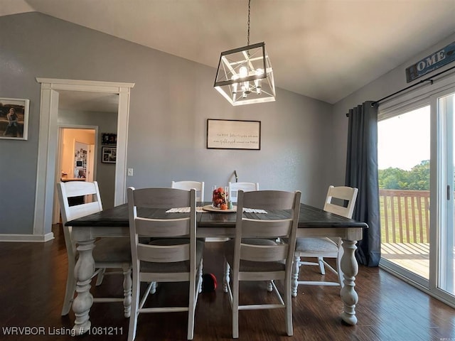 527 Polk Road 59, Mena, AR 71953 - dining space with vaulted ceiling, dark wood-type flooring, a chandelier, and baseboards