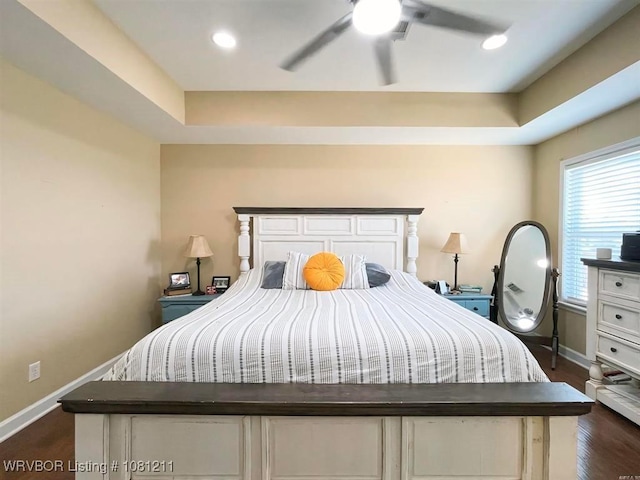 527 Polk Road 59, Mena, AR 71953 - bedroom with baseboards, a raised ceiling, recessed lighting, a ceiling fan, and dark wood finished floors