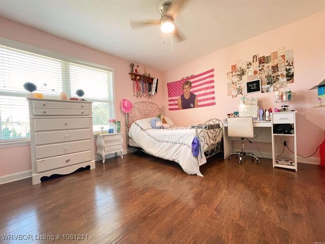 527 Polk Road 59, Mena, AR 71953 - bedroom with wood finished floors, baseboards, and ceiling fan