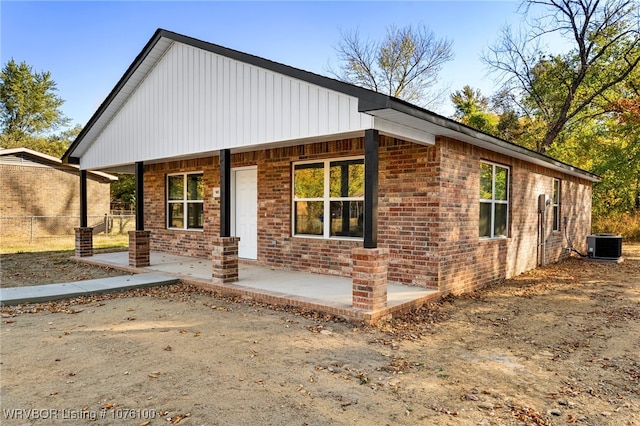 exterior space with covered porch and central air condition unit