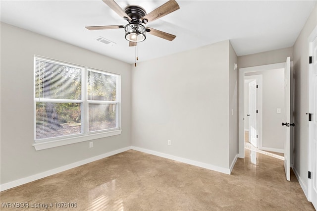 unfurnished room with ceiling fan