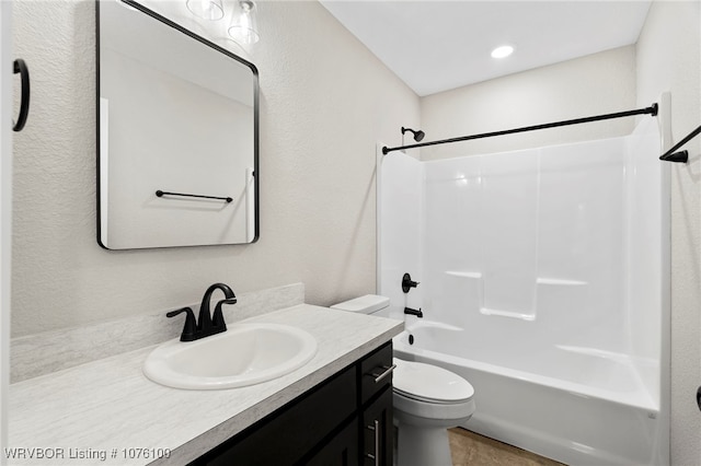 full bathroom with vanity, toilet, and tub / shower combination