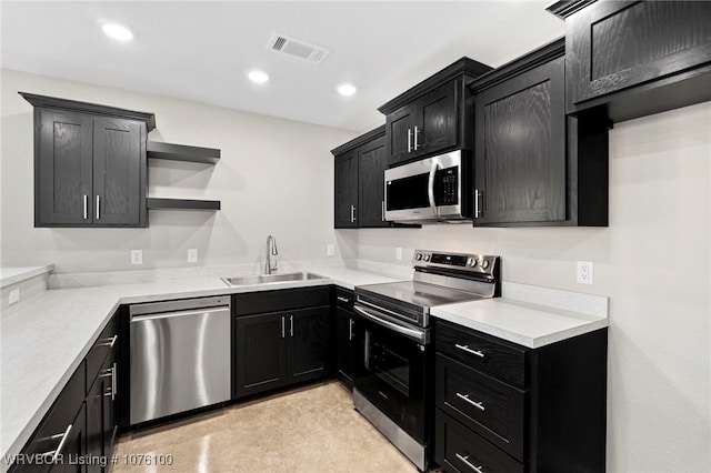 kitchen featuring appliances with stainless steel finishes and sink