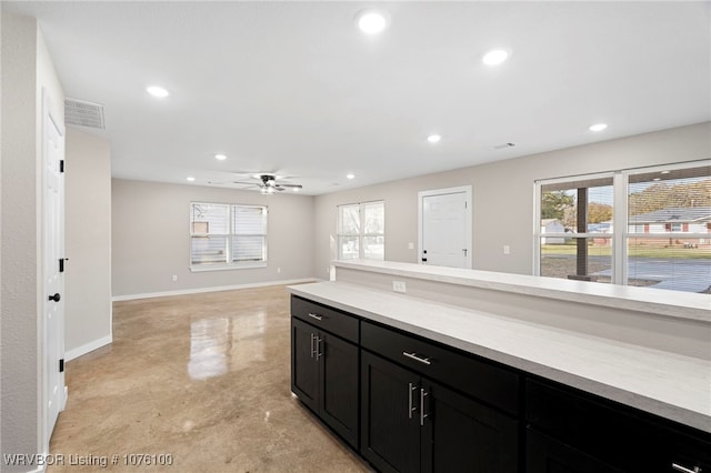 kitchen featuring ceiling fan