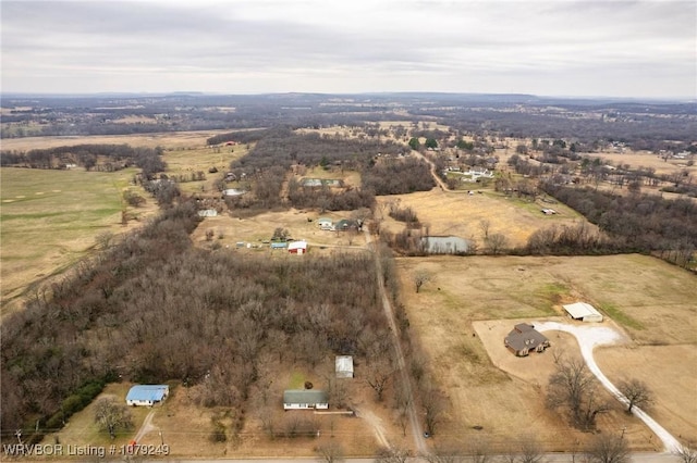 birds eye view of property featuring a rural view