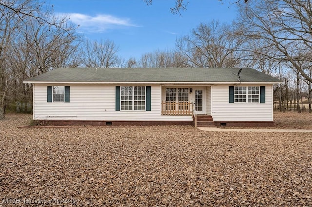 rear view of house with crawl space